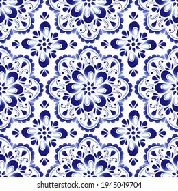 Seamless pattern from blue floral stylized ornament on a white background in Russian style
