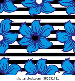 Seamless pattern with blue flowers on striped black background. Vector illustration