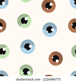 Seamless pattern of blue, green and brown eyes on a beige background.