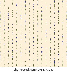 Seamless pattern of blue and green spots on a cream background.
