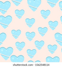 Seamless pattern with blue hearts and snowflakes. Christmas seamless pattern