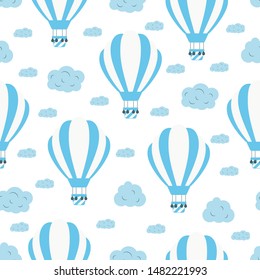 Seamless pattern with blue hot air balloons in the sky with clouds. Cute vector baby background. Vector concept wallpaper for children design.