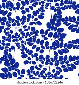 Seamless pattern with blue leaves. Abstract background texture.