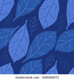 Seamless pattern of blue leaves on a blue background