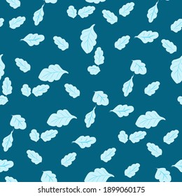 Seamless pattern with blue leaves on a blue background.