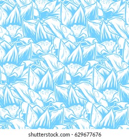 Seamless pattern with blue lotus flowers. Blue lilies on a white background. It can be used as wallpaper, printing, wrapping, fabric or background for your blog and your design.