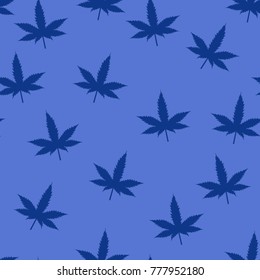 Seamless pattern from blue marijuana leaves on a blue background
