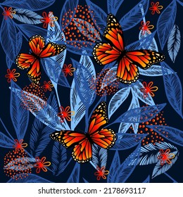 Seamless pattern of blue and orange butterflies. Vector illustration