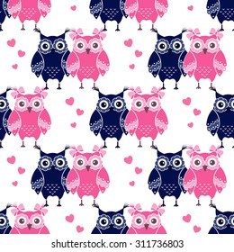 Seamless pattern with blue and pink owls