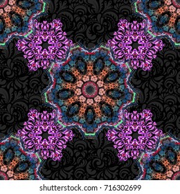Seamless pattern of blue and pink textured curls. Vector brilliant lace, stylized flowers, paisley. Openwork weaving delicate, abstract background. Oriental style arabesques on a black backdrop.