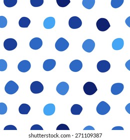 Seamless pattern with blue polka dots of different shades/ Hand drawn design element/ Abstract background