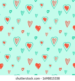 Patrón sin inconvenientes de corazones azules y rojos. Dibujo manual de corazones azules y rojos en fondo azul