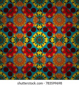 Seamless pattern in blue, red and orange colors. Vector background with tiles and rhombus. Vector geometrical seamless ornament.