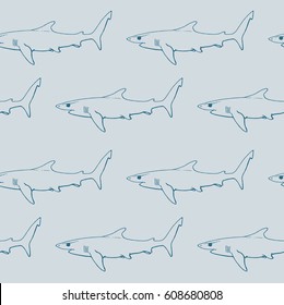 seamless pattern with blue shark contour on colored in blue background