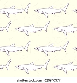 seamless pattern with blue shark contour on colored on rose background