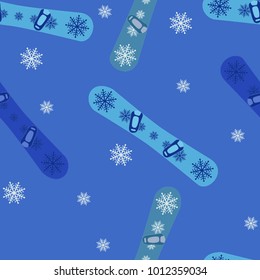 Seamless pattern of blue snowboards and snowflakes on a blue background