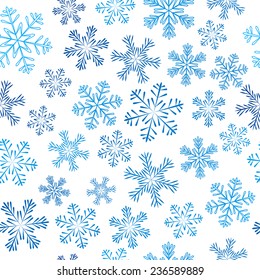 Seamless pattern with blue snowflakes