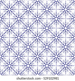 Seamless pattern with blue snowflakes