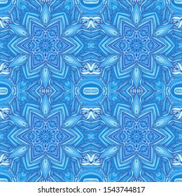 Seamless pattern. Blue snowflakes on an openwork background. Checkered structure.