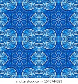 Seamless pattern. Blue snowflakes on an openwork background. Checkered structure.