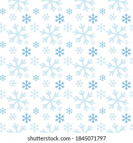 Seamless pattern with blue snowflakes on a white background