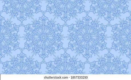 Seamless pattern with blue snowflakes on light blue background. Hand drawn snowflake. Winter blue background. Good for wrapping paper, textile, paper cards etc.