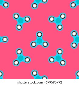 Seamless pattern with blue spinners on pink background. Fidget spinner concept. Vector illustration