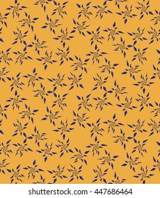 Seamless pattern of blue stylized stars or snowflakes on a yellow background