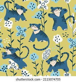 Seamless pattern with blue tiger cubs playing among the flowers. Childs drawing style. Wallpaper, backgound for kids. Perfect for baby, toddler clothing, bed linen