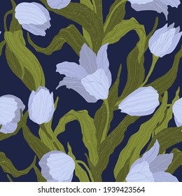 Seamless pattern of blue tulip flowers on dark blue background. Vector illustration. Best for wrapping, textile or print design. Symbol of springtime. 