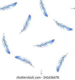 Seamless pattern with blue watercolor feathers.