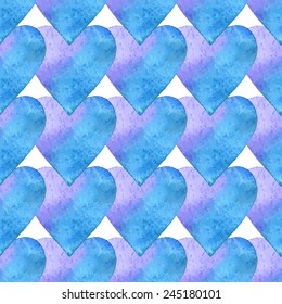 Seamless pattern of blue watercolor hearts on a white background.