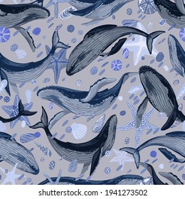 Seamless pattern of blue whales, starfish, seashells. Hand drawn vector illustration. Beautiful underwater ornament. Colored оcean design for fabric, textile, background, wallpaper, print, decor, wrap