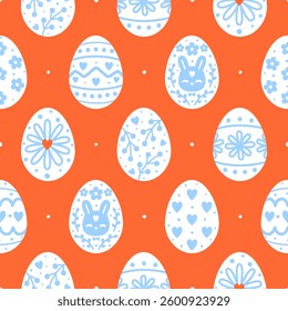 Seamless pattern with blue and white decorative Easter eggs on red background for Your spring holiday design