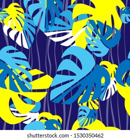 Seamless pattern. Blue, white and yellow tropical monstera leaves on dark blue backround. Vector graphic illustration.