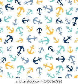 Seamless pattern with blue and yellow anchors. Cute and childish design for fabric, textile, wallpaper, bedding, swaddles or gender-neutral apparel.