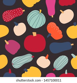 Seamless pattern with blue, yellow, burgundy and beige  stylized pumpkins. Halloween vector pumpkins texture. Perfect for wrap paper, wallpaper, background, seasonal fabric print.