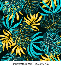 Seamless pattern with blue and yellow tropical plants and leaves. Floral seamless vector tropical pattern background with exotic leaves, jungle leaf. Exotic wallpaper, Hawaiian style.