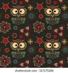 Seamless pattern Boho ornamental owl illustration, ethnics abstract doodle on floral background, sketch of totem animal with feather in tribal decor 