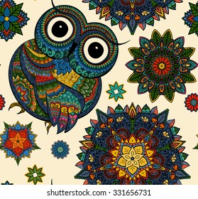 Seamless pattern Boho ornamental owl illustration, ethnics abstract doodle on floral background, sketch of totem animal with feather in tribal decor 