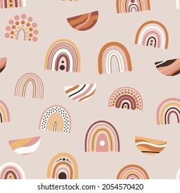 Seamless pattern with boho rainbows in terracotta colors. Neutral nursery art design for decoration, bohemian printing for fabric and wall art. Hand drawn vector illustration.