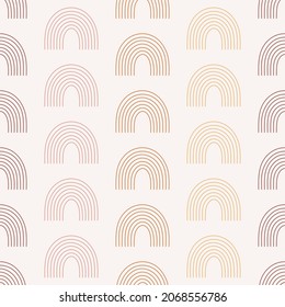 Seamless pattern with boho rainbows in terracotta colors. Neutral nursery art design for decoration, bohemian printing for fabric and wall art. Hand drawn vector illustration.