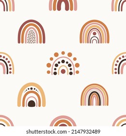Seamless pattern with boho rainbows in terracotta colors. Neutral nursery art design for decoration, bohemian printing for fabric and wall art. Hand drawn vector illustration.