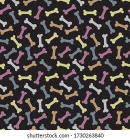 
Seamless pattern with bones,  favorite dog food. Dogs food with bones colorful drawing on a black background.