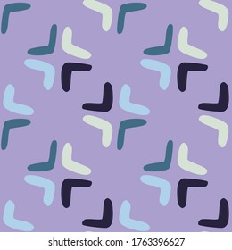 Seamless pattern with boomerang on purple background. Abstract shape endless wallpaper. Decorative backdrop for fabric design, textile print, wrapping. Vector illustration.