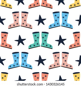 Seamless pattern with boots in Rainey weather.Vector design for wrapping paper, textile. 