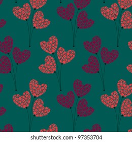 Seamless pattern with bouquets of flowers in the form of hearts.
