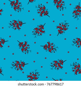 seamless pattern of a branch of a red ripe berry on a blue background