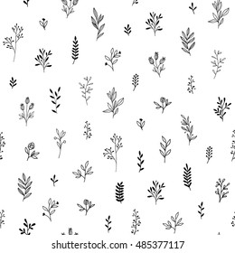 Seamless pattern of branches and herbs.