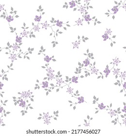 seamless pattern of branches of leaves and flowers on a white background